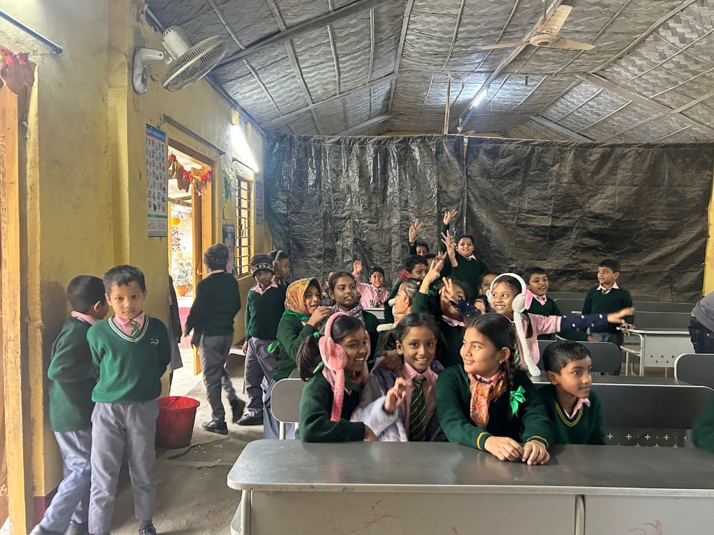 Students in a classroom during a mentorship workshop